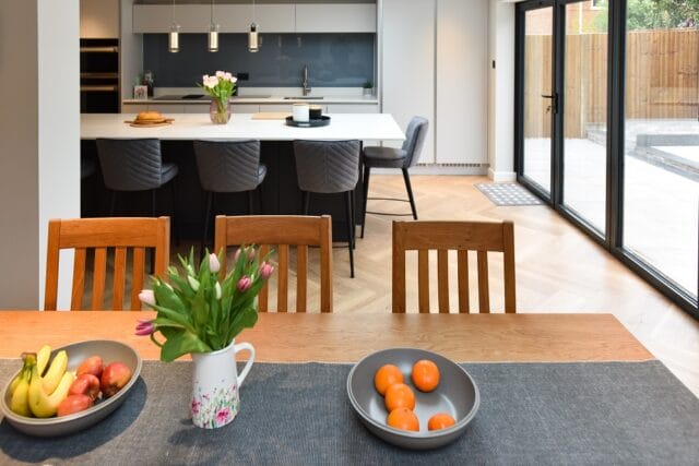Handleless supermatt kitchen in graphite and light grey