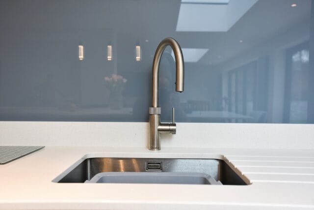 Handleless supermatt kitchen in graphite and light grey
