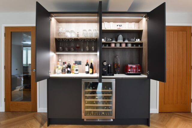Handleless supermatt kitchen in graphite and light grey