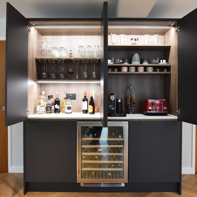 Handleless supermatt kitchen in graphite and light grey